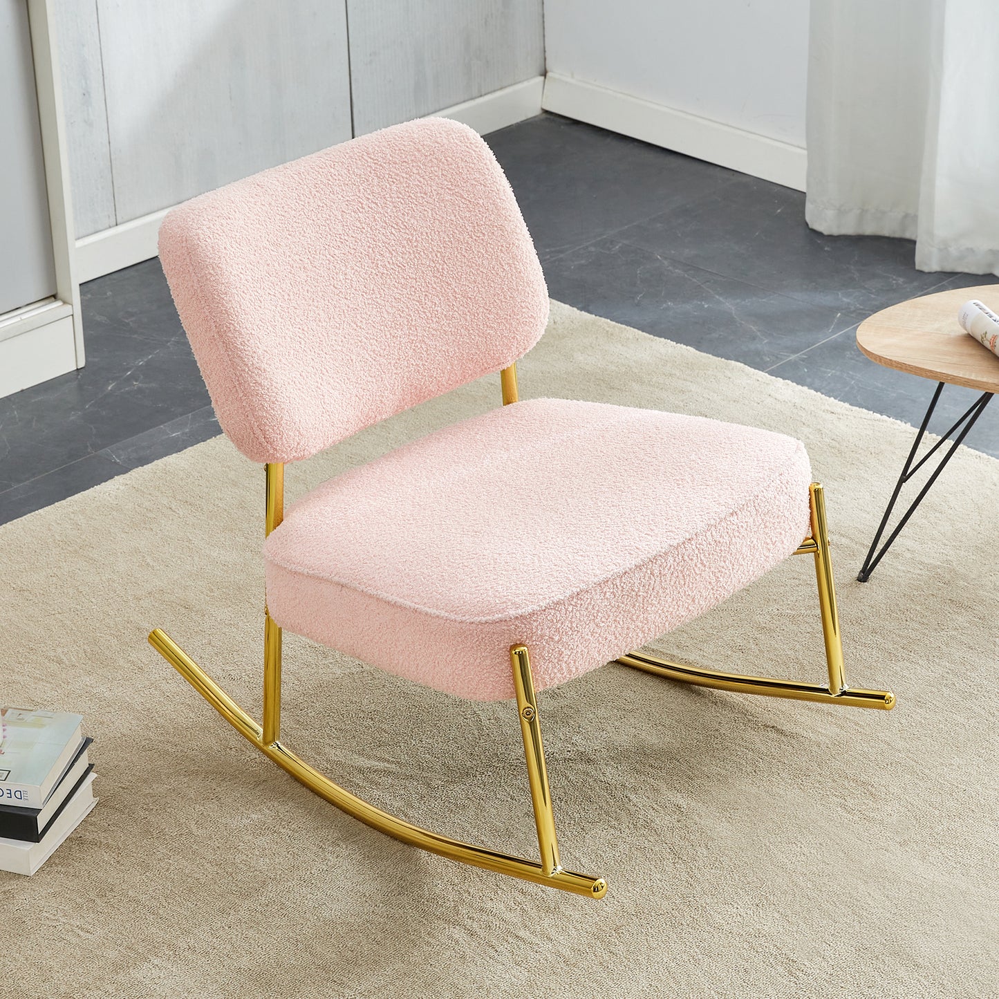 Teddy velvet material cushioned rocking chair, unique rocking chair, cushioned seat, pink backrest rocking chair, and golden metal legs. Comfortable side chairs in the living room, bedroom, and office