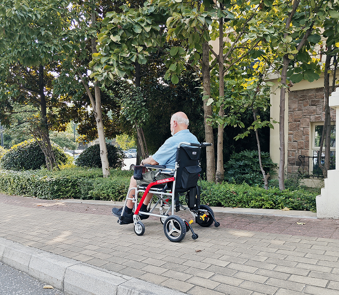 White folding electric wheelchair.  Mobile mobility scooter 24V / 650W 30km / h folding travel portable portable mobility scooter, mid-sized motorcycle