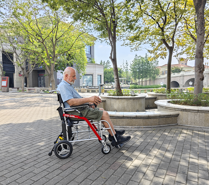 White folding electric wheelchair.  Mobile mobility scooter 24V / 650W 30km / h folding travel portable portable mobility scooter, mid-sized motorcycle